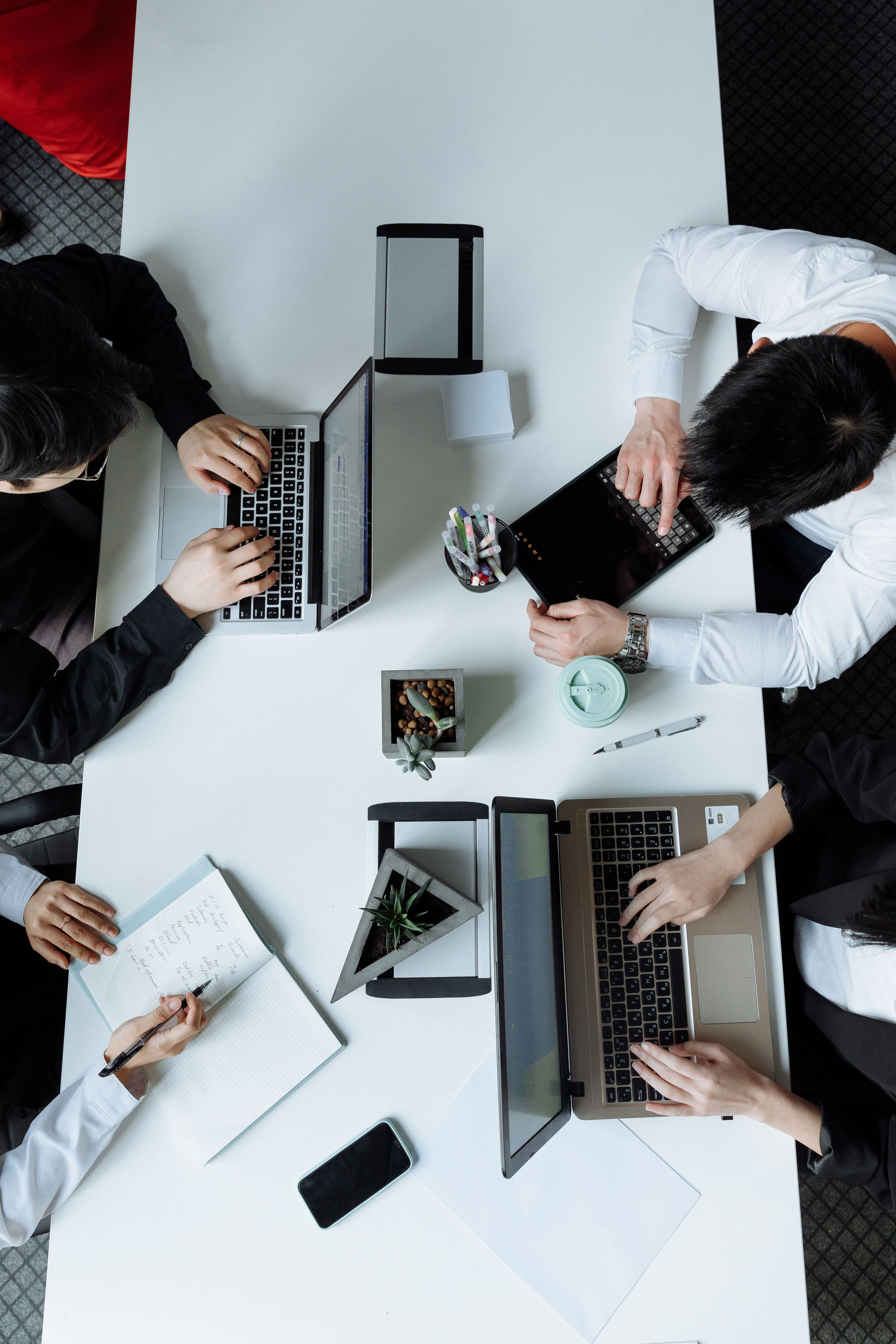 Corstar engineers working together around a shared table