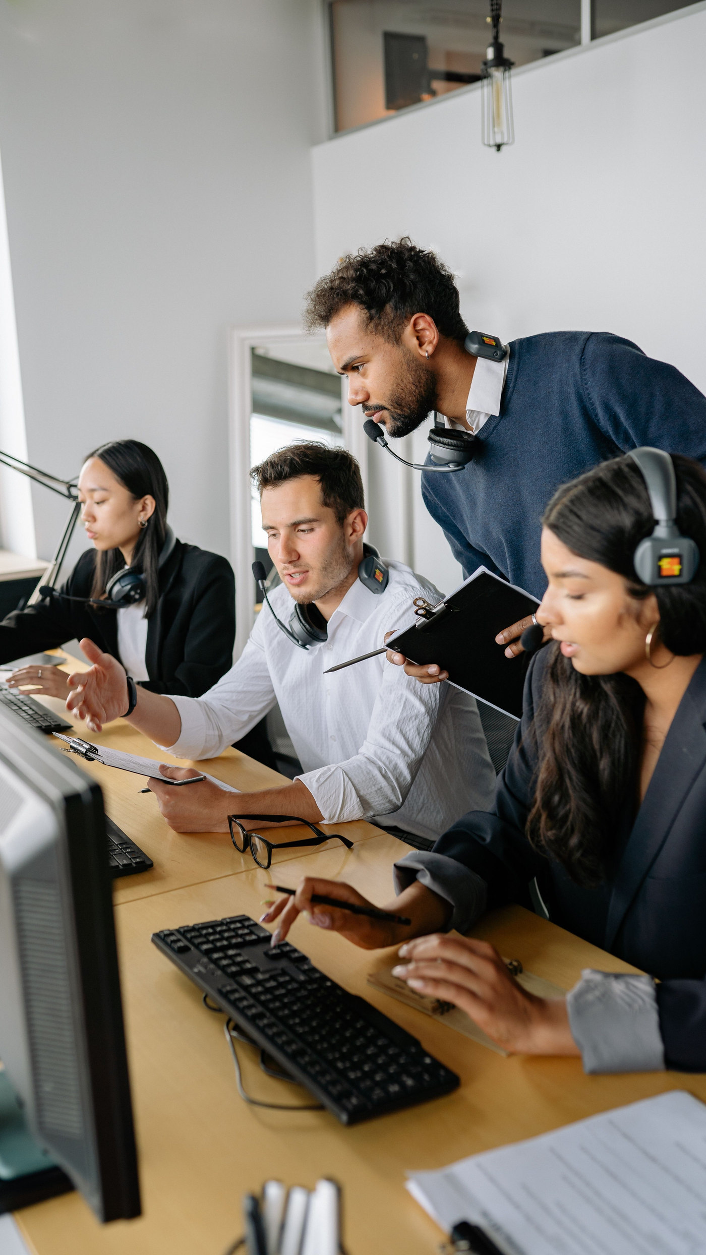 Corstar support engineers reviewing a client issue at their desks